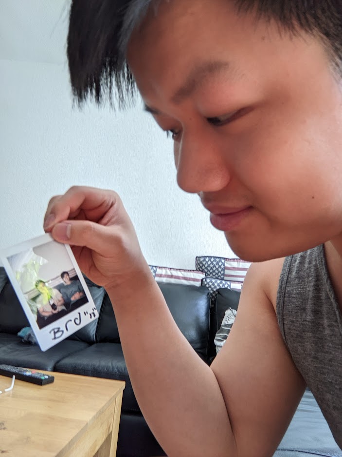 photo of Balinh holding a picture